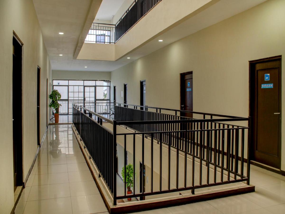 Oyo 90162 Remboelan Guest House Sungai Lutus Екстер'єр фото