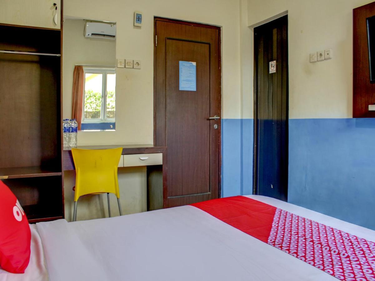 Oyo 90162 Remboelan Guest House Sungai Lutus Екстер'єр фото