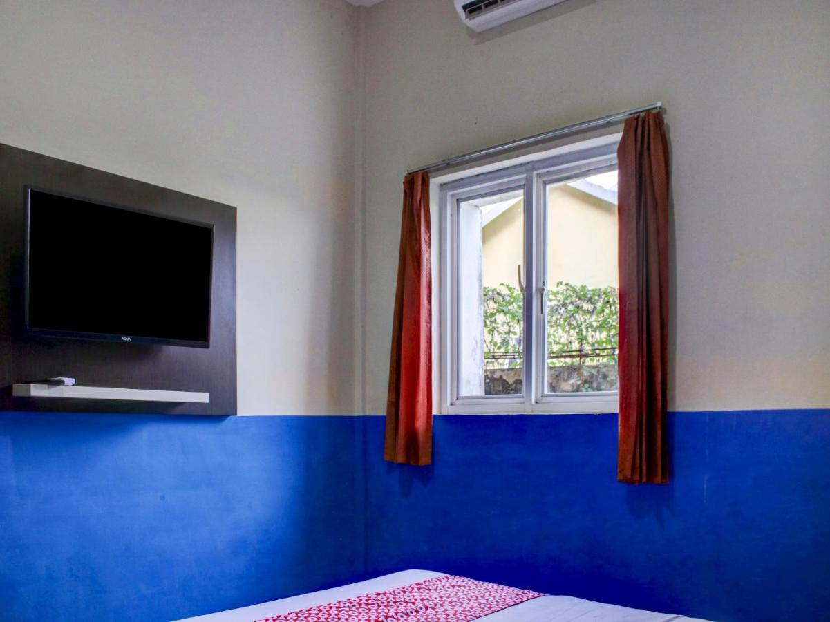 Oyo 90162 Remboelan Guest House Sungai Lutus Екстер'єр фото