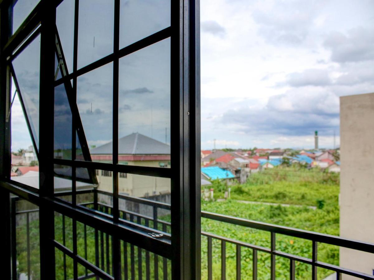 Oyo 90162 Remboelan Guest House Sungai Lutus Екстер'єр фото